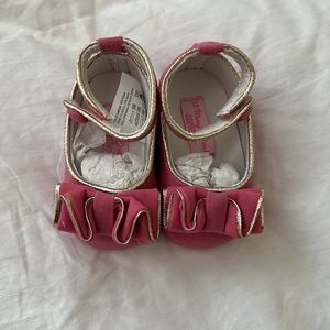 Pink baby shoes